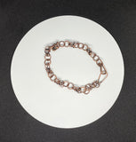 Delicate Copper bracelet created from handmade links with copper bead accents.