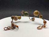 Heavy Gauge Copper that has been shaped and curved in this organic freeform bracelet with Picasso Jasper Beads.