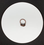 Beautiful Little Brown Jasper Cabochon (created by Monkeylion Designs) wrapped in square copper that is handwoven and coiled.