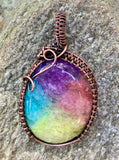 Colorful Rainbow Quartz (dyed) wrapped in handwoven copper. A great way to brighten any day!!