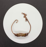 Creamy yellow to brown Agate Bracelet wrapped in handwoven copper with adjustable length fastener.