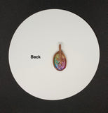 Small Rainbow Quartz (dyed) Cabochon with beautiful pastel colors wrapped in handwoven polished Copper.
