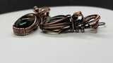 Copper embraces smoky quartz in these earrings, the stones glinting like twilight through mist. Niobium ear wires complete the design with a gentle, skin-friendly touch.