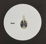 Blue Striped Agate Pendant in wire wrapped Sterling Silver