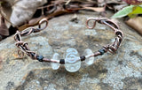 Heavy gauge Copper Bracelet with Woven Copper, Copper Swirls, Clear Lampwork Glass and Glass beads.