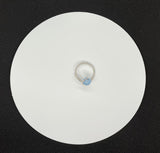 This elegant ring features a stunning Blue Chalcedony gemstone, wrapped in wire with Argentium Silver for a refined and durable finish. The ring is adjustable, accommodating sizes 5 to 8, ensuring a perfect fit for any finger. The soft blue hue of the chalcedony contrasts beautifully with the bright, shiny silver, creating a sophisticated and versatile piece that can complement any style.