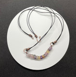 Multi-colored tumbled Fluorite, Copper and Leather Necklace.