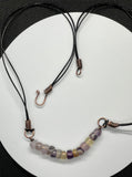Multi-colored tumbled Fluorite, Copper and Leather Necklace.