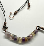 Multi-colored tumbled Fluorite, Copper and Leather Necklace.