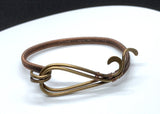 This standout bracelet features hammered brass waves, interwoven with intricate handwoven copper detailing. The combination of textures and warm metallic tones creates a unique and eye-catching piece that exudes both elegance and craftsmanship. Perfect for those who love bold, artisanal jewelry, this bracelet adds a touch of sophistication to any look.