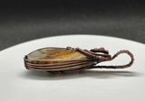 This Colorful Lace Agate Pendant in Wire Wrapped Copper is ideal for individuals who appreciate the beauty of natural gemstones and the artistry of handcrafted jewelry. It appeals to those who love unique, statement pieces with vibrant colors and intricate designs. This pendant is perfect for fashion-forward individuals who value both style and the natural charm of gemstones.