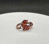 This ring features a beautifully carved Red Jasper crescent moon, wrapped in warm copper wire for an earthy and elegant design. The adjustable band allows for a comfortable fit, making it a versatile addition to any jewelry collection. Red Jasper, known for its grounding and protective properties, adds a bold yet natural touch to this handcrafted piece. Perfect for moon lovers and those who appreciate unique, artisan jewelry!