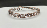 Multi Strand Copper Bracelet that has been braided and hammered.