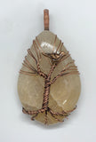 This Tumbled River Rock with Copper Tree and Bronze Bird is a stunning piece of natural artistry that brings together the rugged beauty of river rock, the elegance of copper, and the timeless charm of bronze. This unique creation makes a perfect accent for any space, blending natural elements with artisanal craftsmanship.