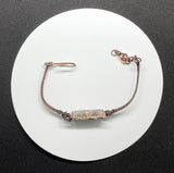 Colorful Leopard Skin Jasper on this Adjustable Wire Wrapped Copper Bracelet.