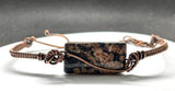 Colorful Leopard Skin Jasper on this Adjustable Wire Wrapped Copper Bracelet.