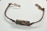 Colorful Leopard Skin Jasper on this Adjustable Wire Wrapped Copper Bracelet.