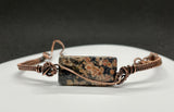 Colorful Leopard Skin Jasper on this Adjustable Wire Wrapped Copper Bracelet.