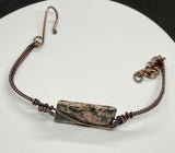 Colorful Leopard Skin Jasper on this Adjustable Wire Wrapped Copper Bracelet.
