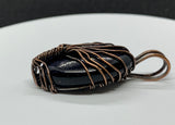 This Blue Goldstone Copper Tree of Life Pendant is a stunning representation of nature and the cosmos, featuring a mesmerizing Blue Goldstone cabochon that shimmers like a dark, starry night sky. Handcrafted in copper, the pendant showcases a Tree of Life design, symbolizing growth, strength, and connection. This pendant is perfect for those who love celestial-inspired jewelry with a touch of natural elegance.
