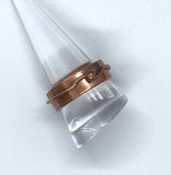 This minimalist yet bold ring is crafted entirely from solid copper, featuring a sleek copper band accent for added texture and visual interest. The rich, warm tones of the copper create a timeless, rustic charm, making it perfect for those who appreciate simple, elegant designs with a handcrafted feel. A versatile piece, this ring adds a touch of earthy sophistication to any look.