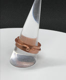 This minimalist yet bold ring is crafted entirely from solid copper, featuring a sleek copper band accent for added texture and visual interest. The rich, warm tones of the copper create a timeless, rustic charm, making it perfect for those who appreciate simple, elegant designs with a handcrafted feel. A versatile piece, this ring adds a touch of earthy sophistication to any look.