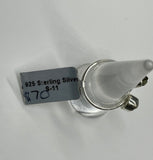 This captivating ring showcases the natural beauty of raw Quartz and raw Moldavite, set in sterling silver for a rustic yet elegant look. The adjustable band fits sizes 6 ½ and up, offering versatility and comfort. The clear, uncut Quartz radiates purity, while the rare, deep green Moldavite adds a touch of otherworldly mystique. Together, these stones are believed to enhance spiritual growth and energy. Perfect for those who appreciate raw, organic beauty, this ring is a unique and powerful statement piece