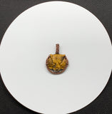 Carved Tiger Eye Tiger Pendant wrapped in Copper