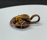 Carved Tiger Eye Tiger Pendant wrapped in Copper