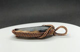 Mystery Blue Stone Pendant in handwoven Copper.
