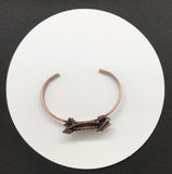 This Hand Woven Copper Cuff Bracelet with Cherry Creek Jasper is a striking piece of jewelry featuring a solid copper cuff with an intricately woven Cherry Creek Jasper centerpiece. This bracelet combines the warmth and durability of copper with the natural beauty of Cherry Creek Jasper, creating a unique and elegant accessory.