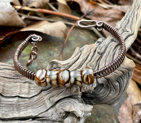 Adjustable Cappuccino Swirl Czech Glass and Wire Wrapped Copper Bracelet.