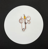 This exquisite shawl or scarf pin features a beautifully hammered copper flower design that adds a touch of artisanal charm to any outfit. The unique texture of the hammered copper catches the light, creating a warm, inviting glow. Versatile and stylish, this pin can be used to secure your favorite shawl or scarf, or worn as a statement brooch on jackets and bags. Elevate your accessory collection with this handcrafted piece that beautifully combines functionality with elegant design.