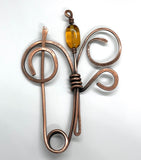 This exquisite shawl or scarf pin features a beautifully hammered copper flower design that adds a touch of artisanal charm to any outfit. The unique texture of the hammered copper catches the light, creating a warm, inviting glow. Versatile and stylish, this pin can be used to secure your favorite shawl or scarf, or worn as a statement brooch on jackets and bags. Elevate your accessory collection with this handcrafted piece that beautifully combines functionality with elegant design.