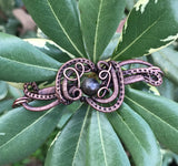This Wire Wrapped Copper Bracelet with Agate is a stunning piece that beautifully marries the elegance of Agate with the intricate artistry of wire wrapping. Its adjustable design ensures a comfortable fit for various wrist sizes, making it a versatile and attractive addition to any jewelry collection.