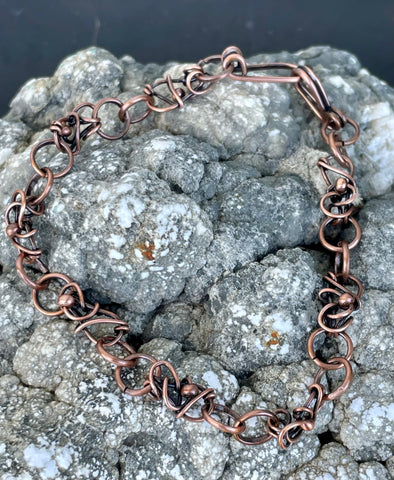 Delicate Copper bracelet created from handmade links with copper bead accents.