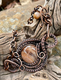 Adjustable Wire Wrapped Copper and Shimmering Peach Sunstone Bracelet.
