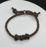 Adjustable Braided Leather Bracelet with Handmade Copper Beads.