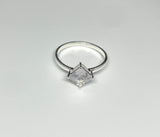 This elegant ring features a beautifully faceted Lavender Quartz, shimmering with soft purple hues and gentle brilliance. Set in polished sterling silver (.925), the setting highlights the stone’s clarity and subtle color, making it a graceful and feminine addition to any jewelry collection.