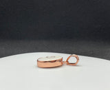 This unique pendant features a natural Shiva Shell, known for its mesmerizing spiral pattern and soothing energy. Set in warm copper, the design highlights the shell’s creamy tones and organic beauty.Sometimes call Shiva Eye Shell.
