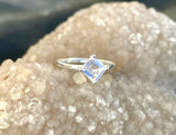 This elegant ring features a beautifully faceted Lavender Quartz, shimmering with soft purple hues and gentle brilliance. Set in polished sterling silver (.925), the setting highlights the stone’s clarity and subtle color, making it a graceful and feminine addition to any jewelry collection.