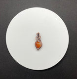 Mini Orange Carnelian Heart Pendant in Copper. 