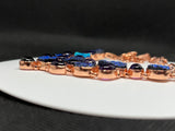 This dazzling necklace features shimmering titanium druzy paired with rich purple Amethyst, all set in warm copper. Brilliant flashes of blue and purple create an eye-catching piece full of sparkle and personality.