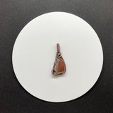 Tumbled Orange and Clear Agate Pendant in Wire Wrapped Copper.