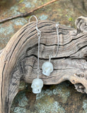 Dangling Intricately Carved Buffalo Bone Skull Earrings in Sterling Silver.