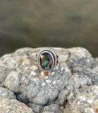 This Sterling Silver Mystic Quartz Ring features a captivating mystic quartz gemstone set in sterling silver. Known for its iridescent, rainbow-like sparkle, mystic quartz adds a touch of enchantment and sophistication to this elegant ring.