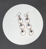 Hypoallergenic Copper Circle and Dark Blue Crystal Earrings.