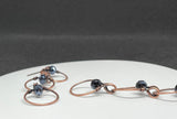 Hypoallergenic Copper Circle and Dark Blue Crystal Earrings.