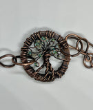 Adjustable Copper Tree of Life Bracelet with Glass Bead leaves.