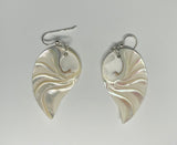 These Sterling Silver Carved Nautilus Shell "Angel Wing" Earrings are a captivating pair of earrings that combine the natural beauty of nautilus shells with the elegance of sterling silver. The earrings feature intricately carved nautilus shells, reminiscent of angel wings, set in high-quality sterling silver. These earrings evoke a sense of grace, nature, and artistry, making them a unique and elegant accessory.